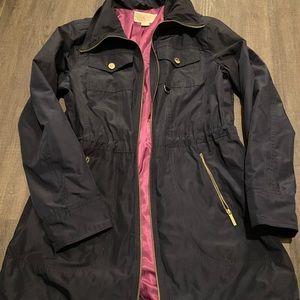 Like new Michaels Kors lightweight jacket. Navy exterior purple inside. Sz Small